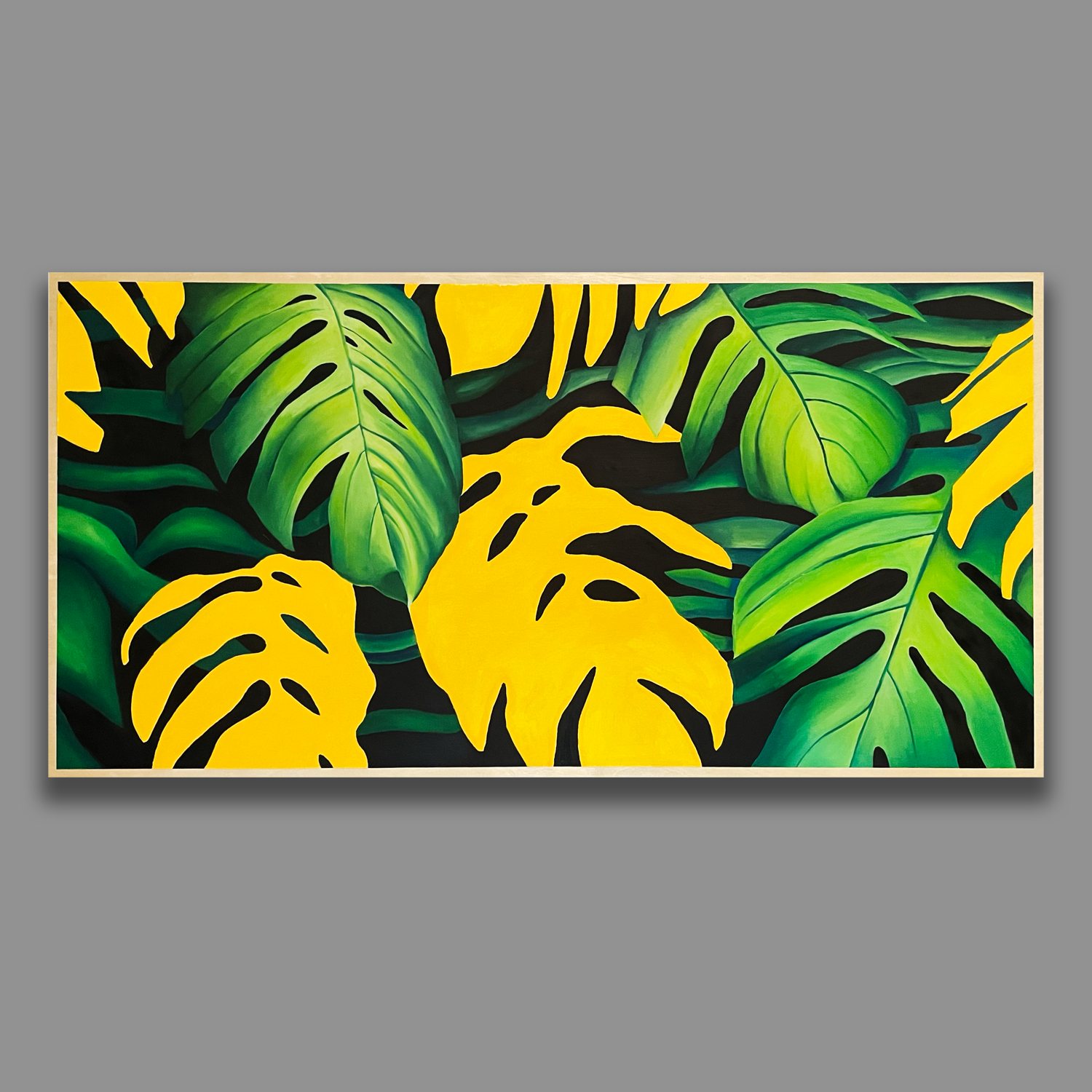 Palms, framed monstera, on black wall